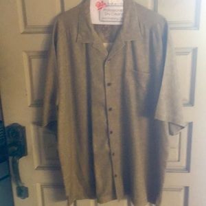 100per cent silk Tommy Bahama shirt with Palm Tree buttons